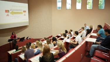 Students sitting in an SRH lecture hall listening to a lecture