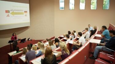 Students sitting in an SRH lecture hall listening to a lecture